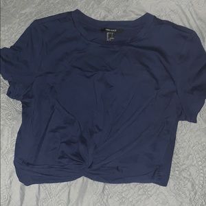 Navy blue cute crop top with a twist at the bottom